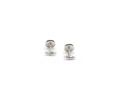 Round silver and black cufflink